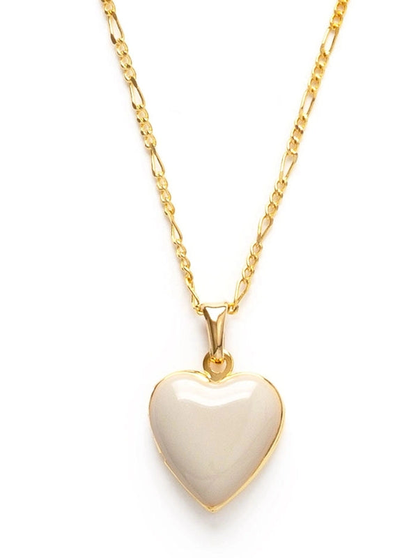Gold necklace with a heart-shaped pendant on a white background