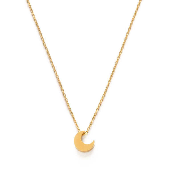 Gold necklace with a crescent moon pendant on a white background