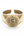 Gold ring with engraved design on a white background