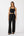 woman wearing black pants and tank top