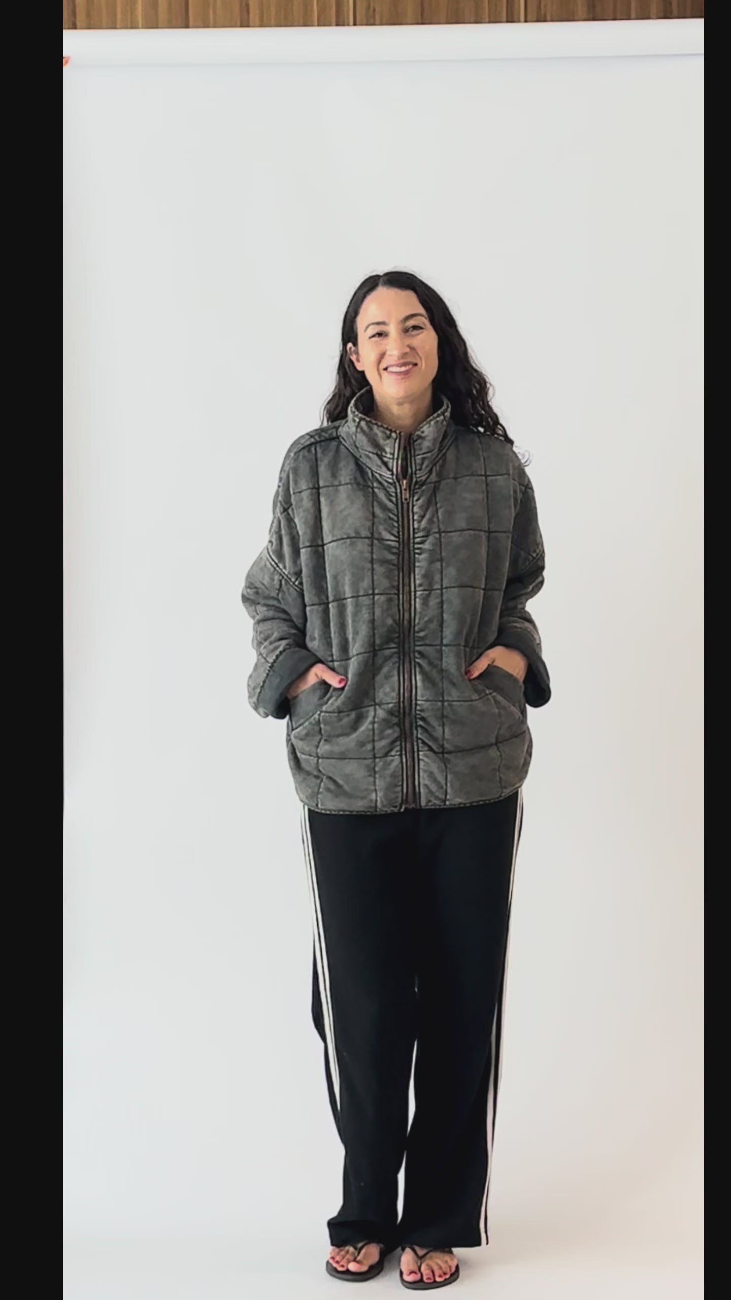 girl in grey jacket and black pants